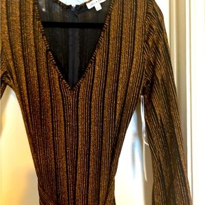 Elegant black and orange jumpsuit.